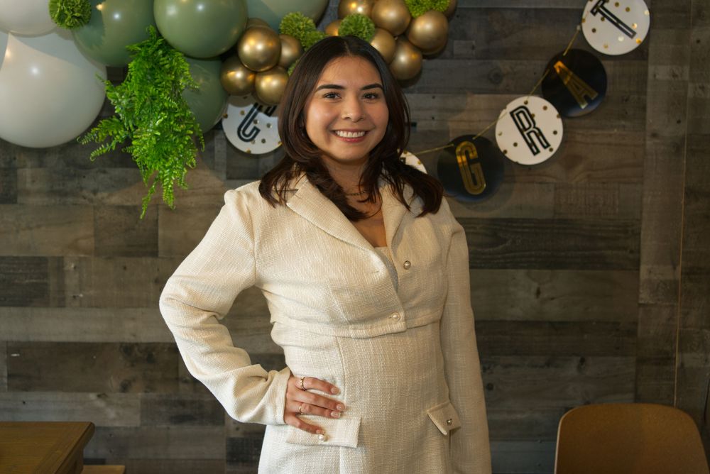 Graduation photoshoot for a formal event. Flash photography