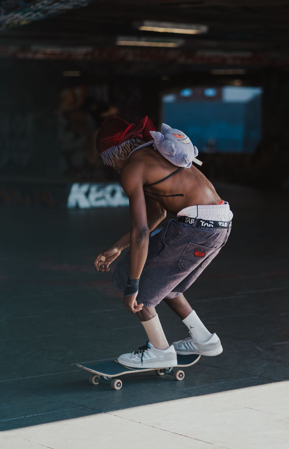Skateboarder preparing for a trick at South Bank Skate Park in London by Shayla Bloom Photography