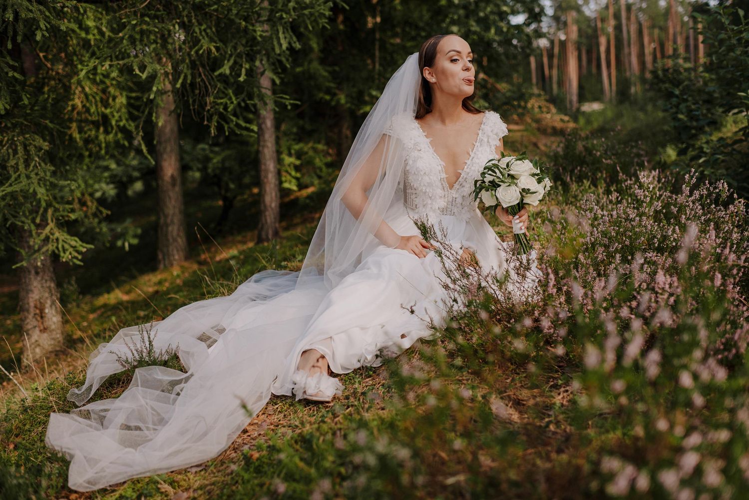 Ethereal bridal portraits taken in a wildflower garden with natural lighting.