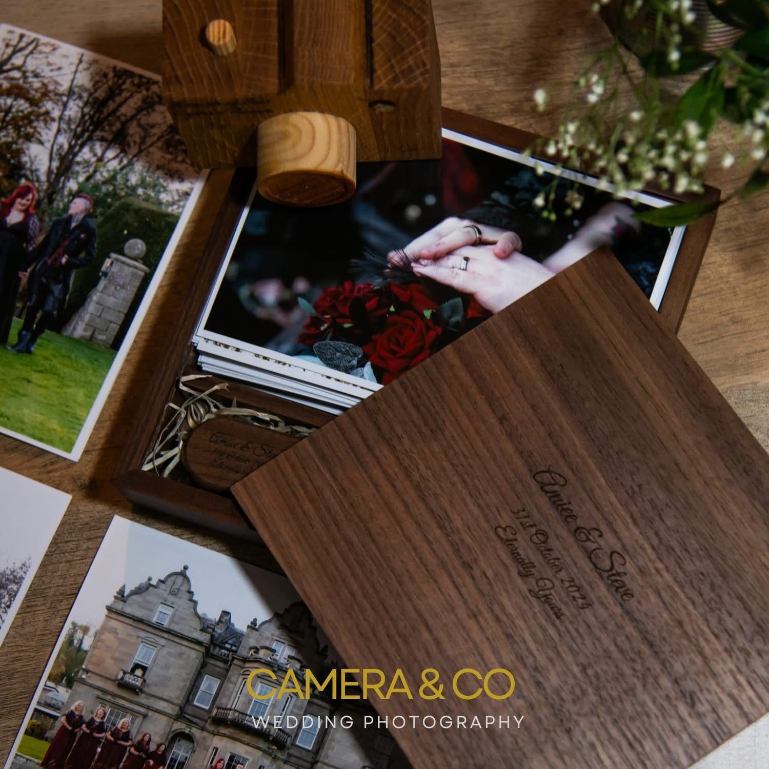 Wooden photography product packaging with brand name and decorative elements.