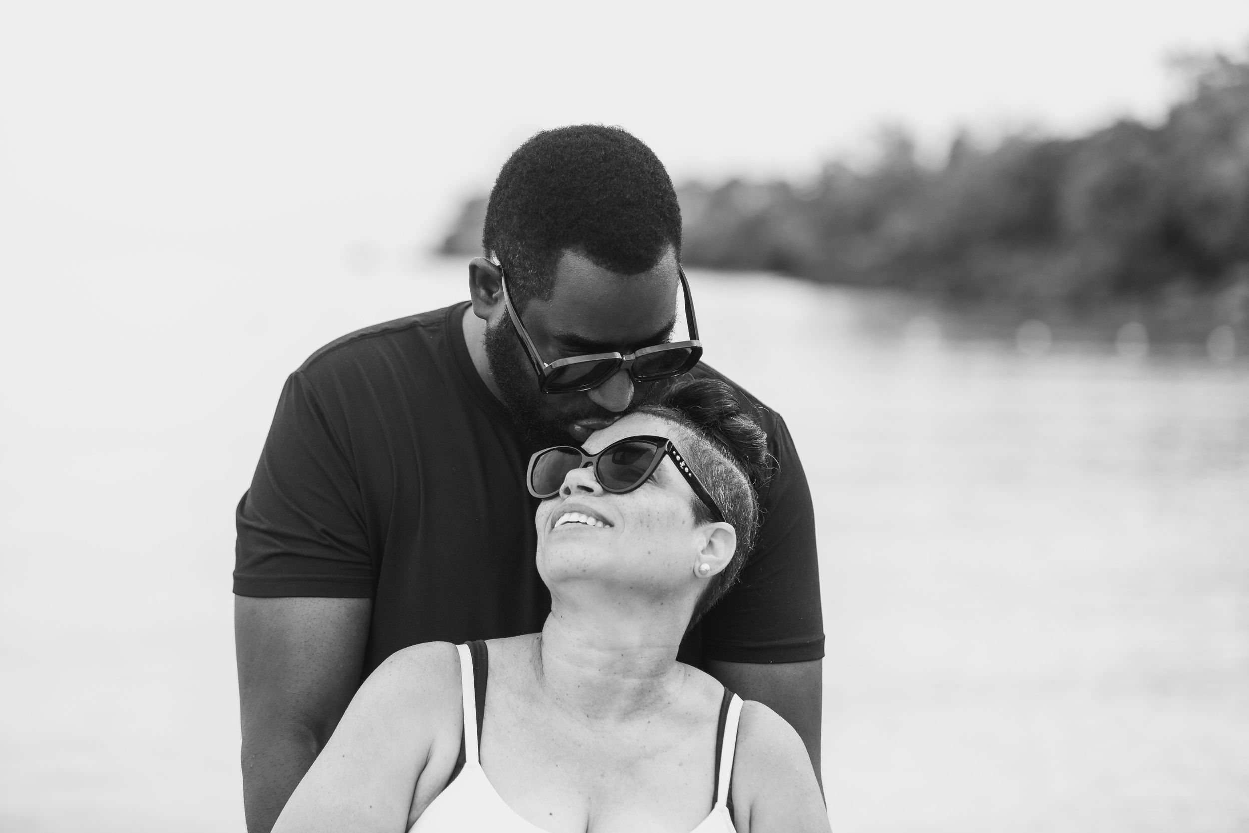 Black and white portrait of a couple together outdoors