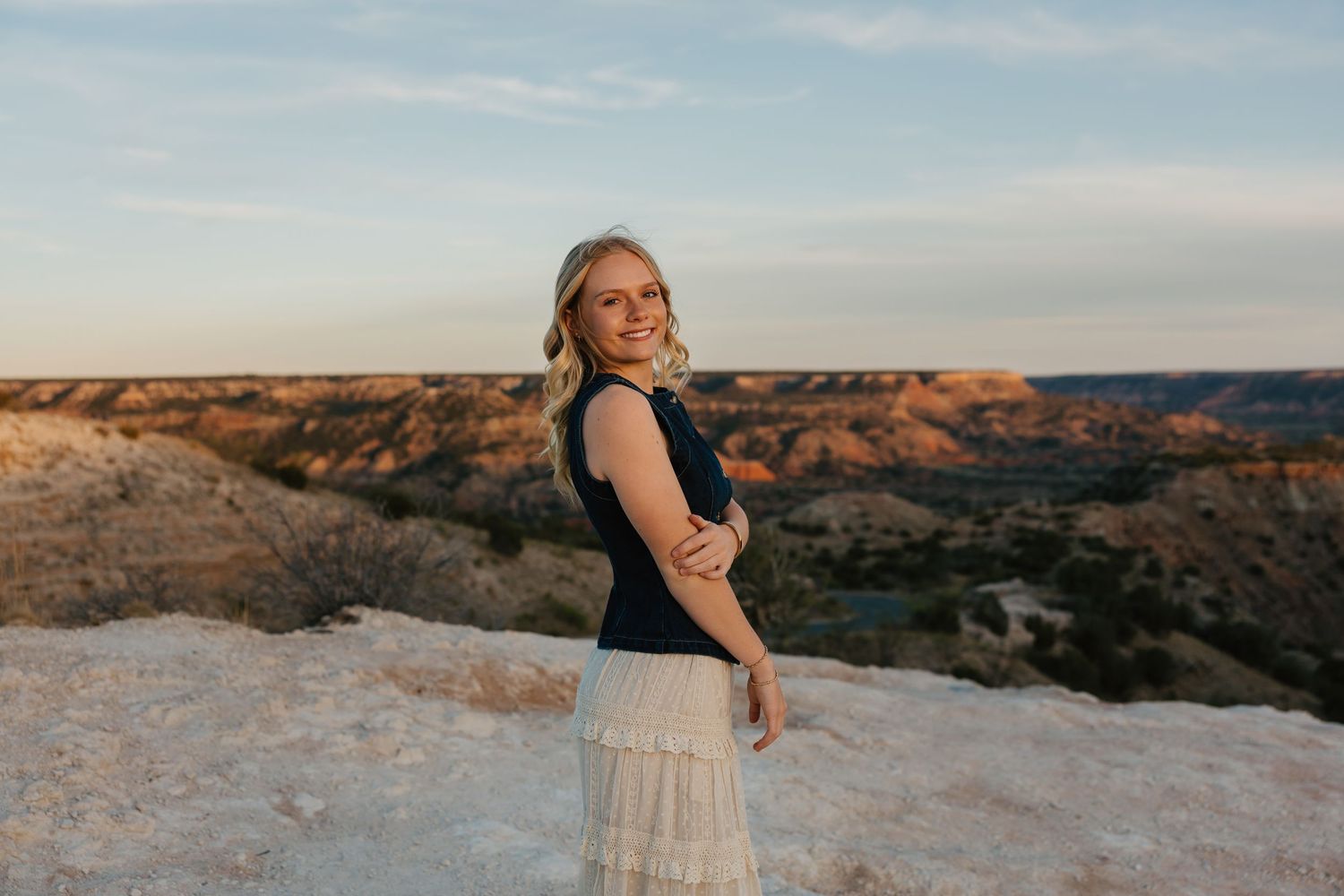 High school senior girl posing outdoors during a senior portrait session in Palo Duro Canyon