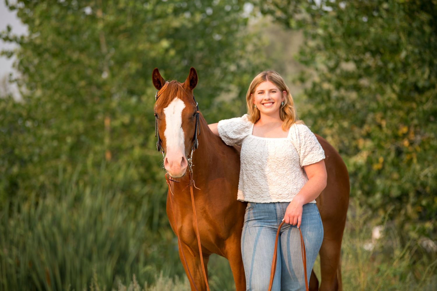 Grace with her horse Boone during golden hour in Grand Junction, Colorado.