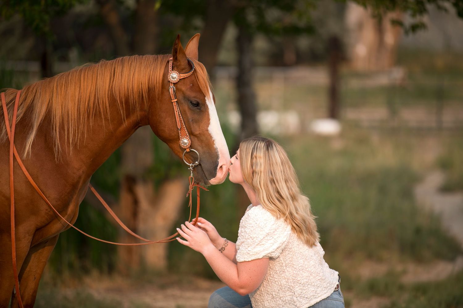Grace with her horse Boone during golden hour in Grand Junction, Colorado.