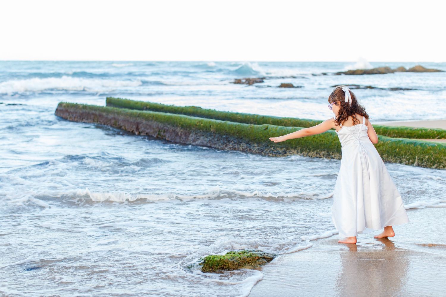 Portrait of a girl on the beach. San Juan, Puerto Rico.