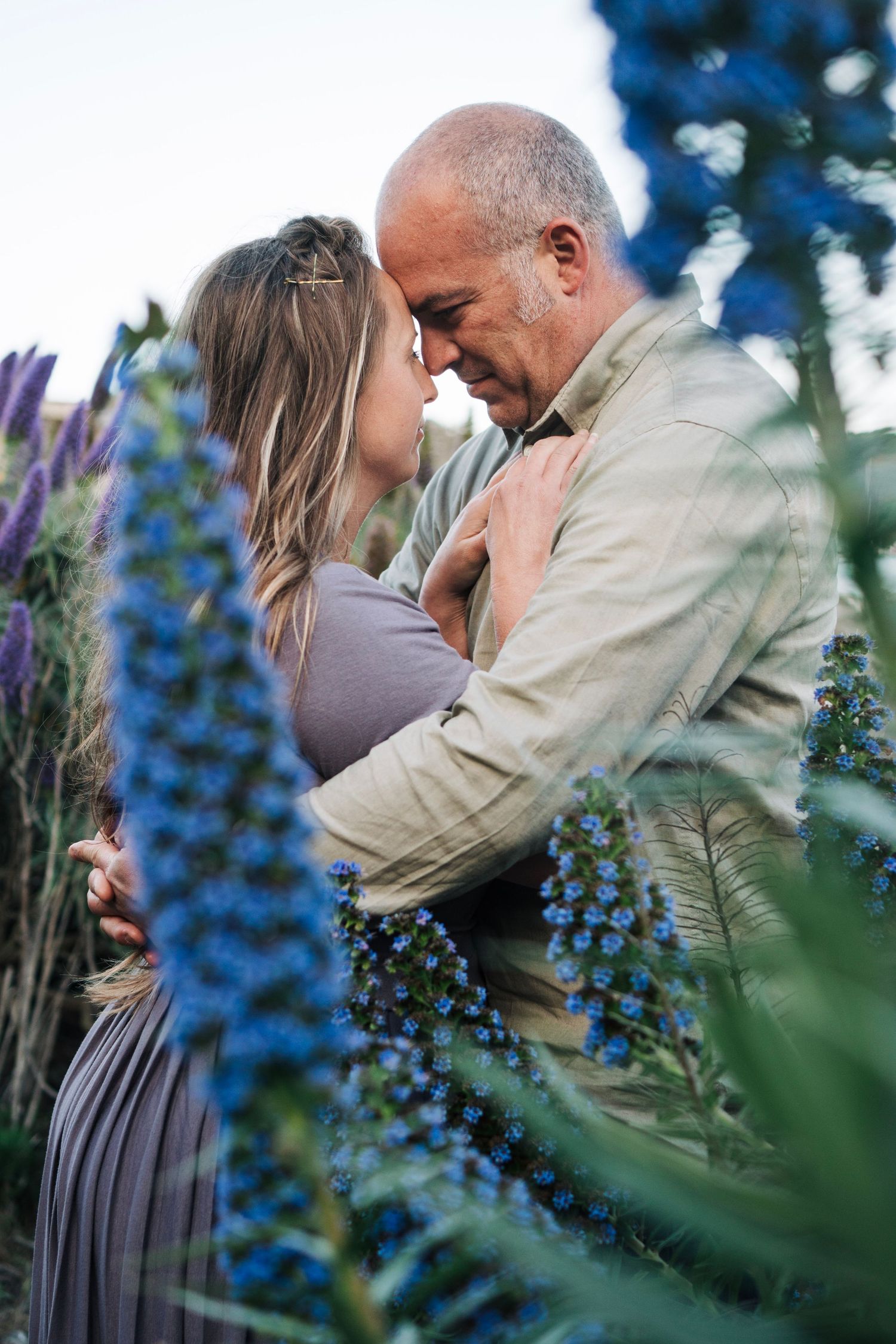 Husband and wife look longingly at each other in marin county