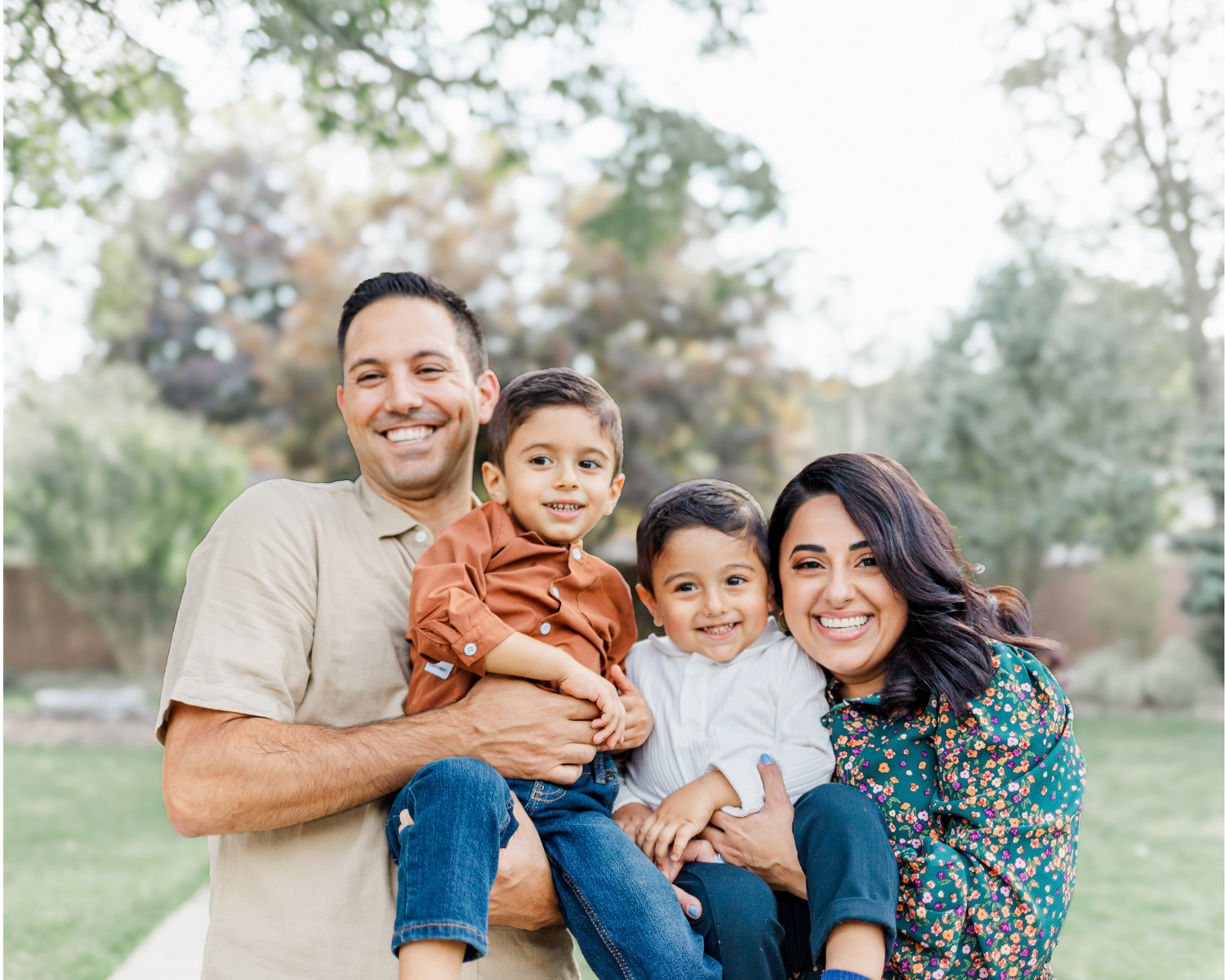 Family dressed in burnt orange, cream, oatmeal and white during Hudson valley fall family photo session