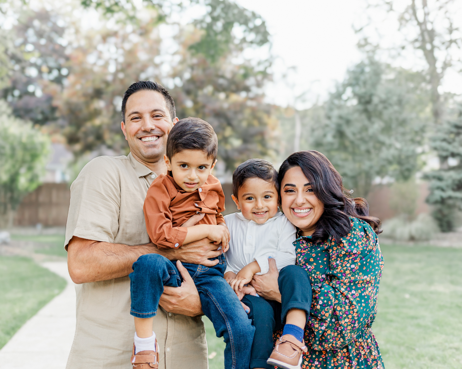 Family dressed in burnt orange, cream, oatmeal and white during Hudson valley fall family photo session