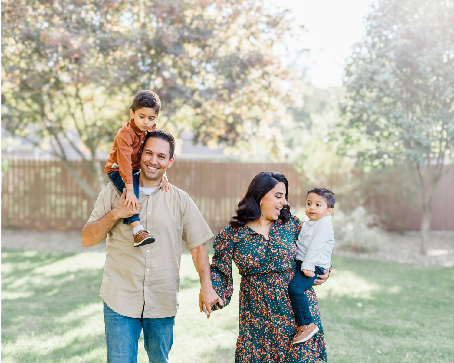 Family dressed in burnt orange, cream, oatmeal and white during Hudson valley fall family photo session