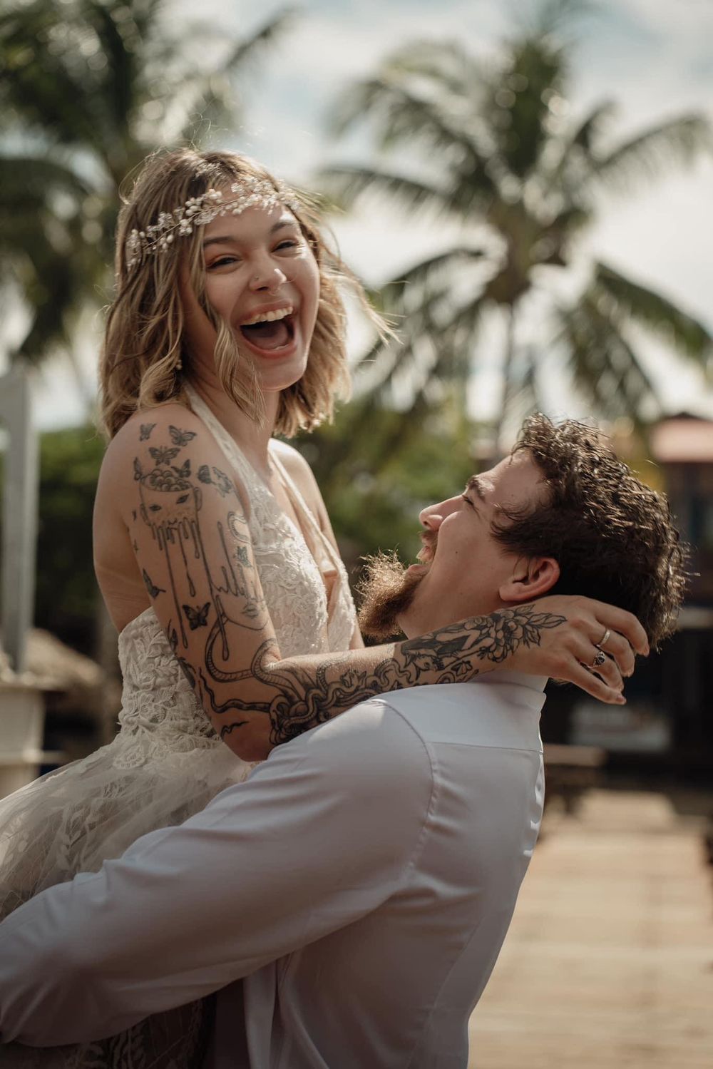 Bride and groom laughing while eloping abroad