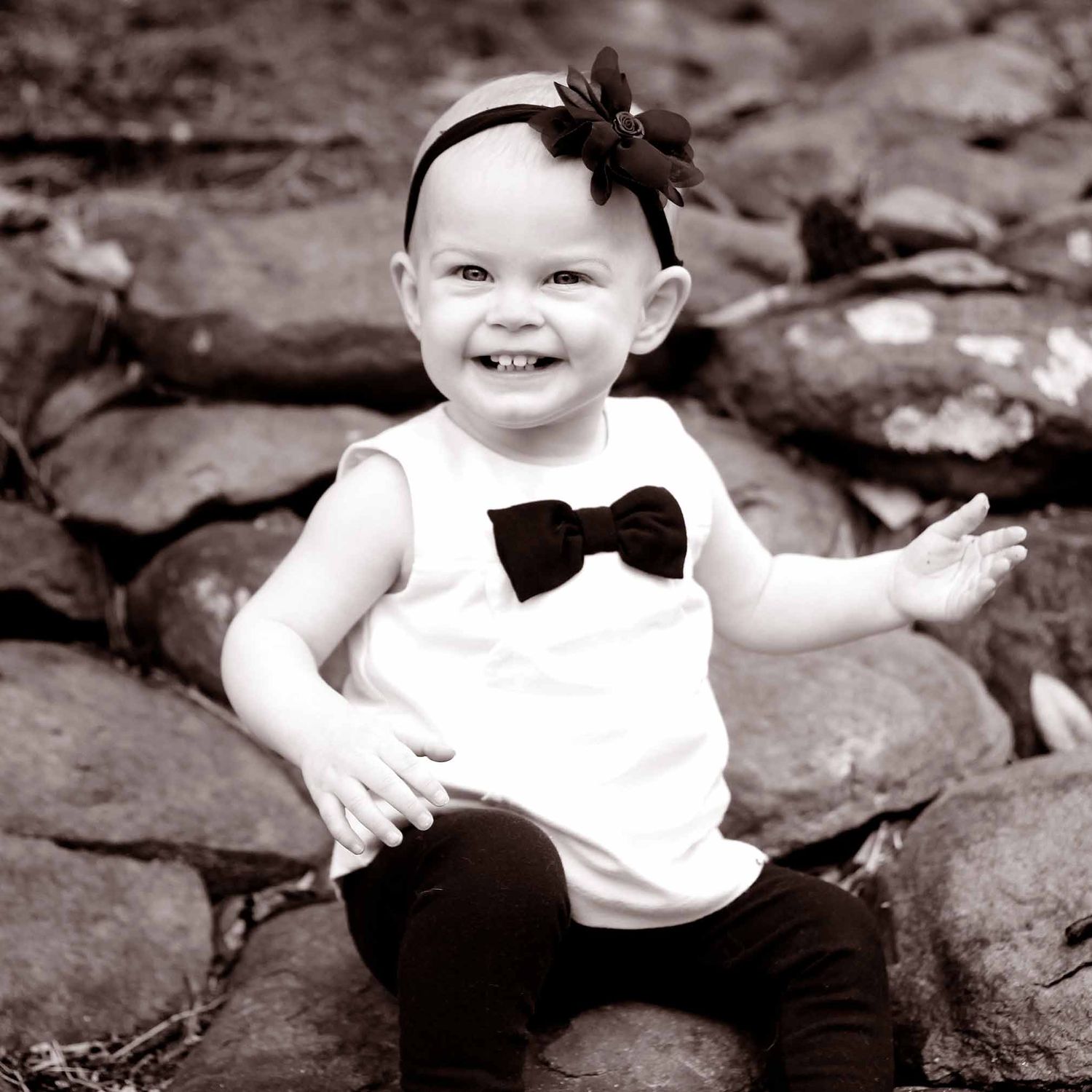 happy baby in black and white photo by victoria leigh photography