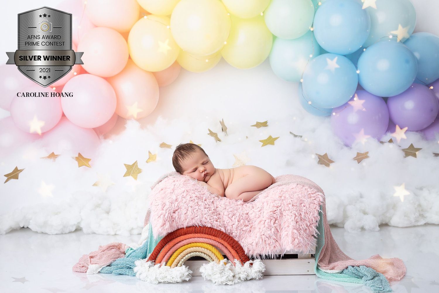 Photographe bébé en studio à Bordeaux et prignac et marcamps à 5min de st andré de cubzac. séance nouveau né en studio. Photo primée