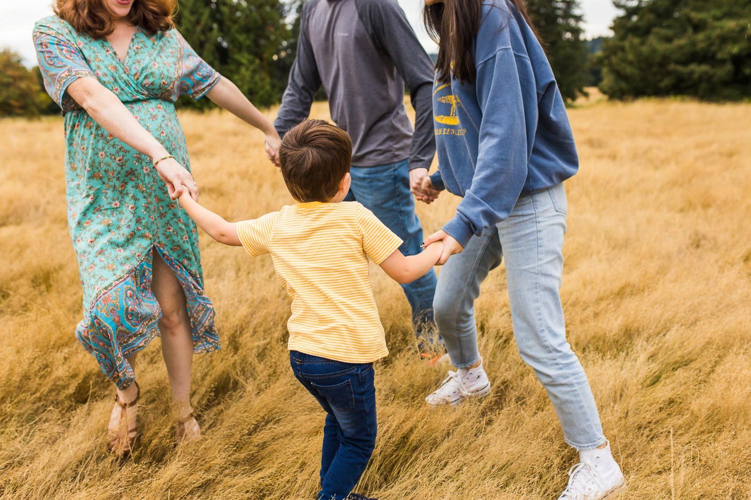 Family playing ring around the rosy