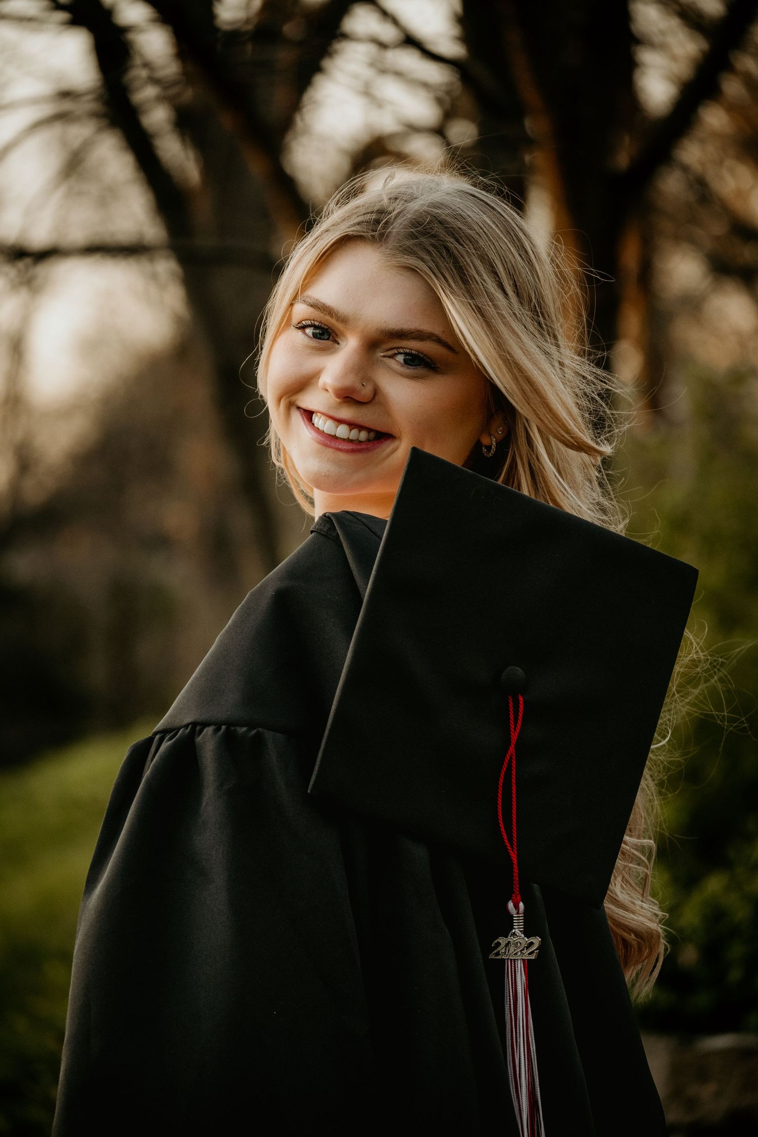college graduate in cap and gown