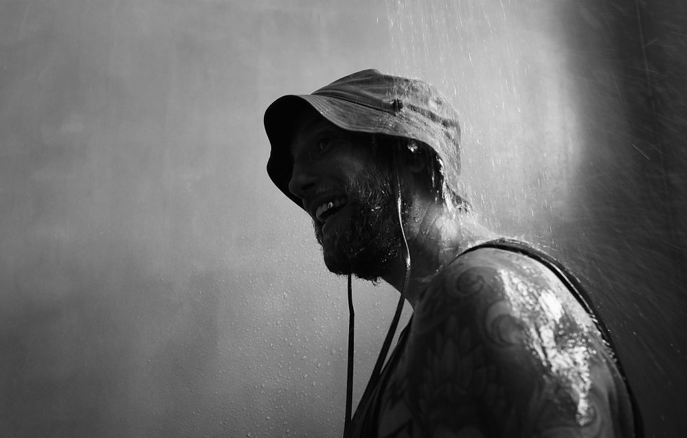 Dramatic black and white portrait sequence showing silhouettes against a dark background.