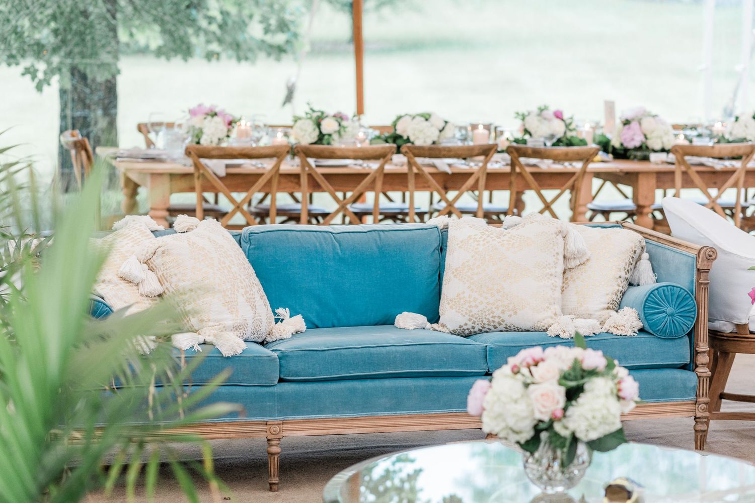 Blue couch sitting space in wedding reception space
