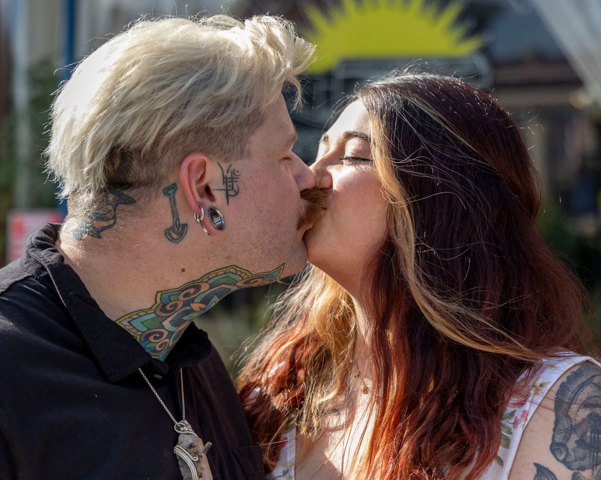 A series of emotional embraces captured in natural outdoor lighting.