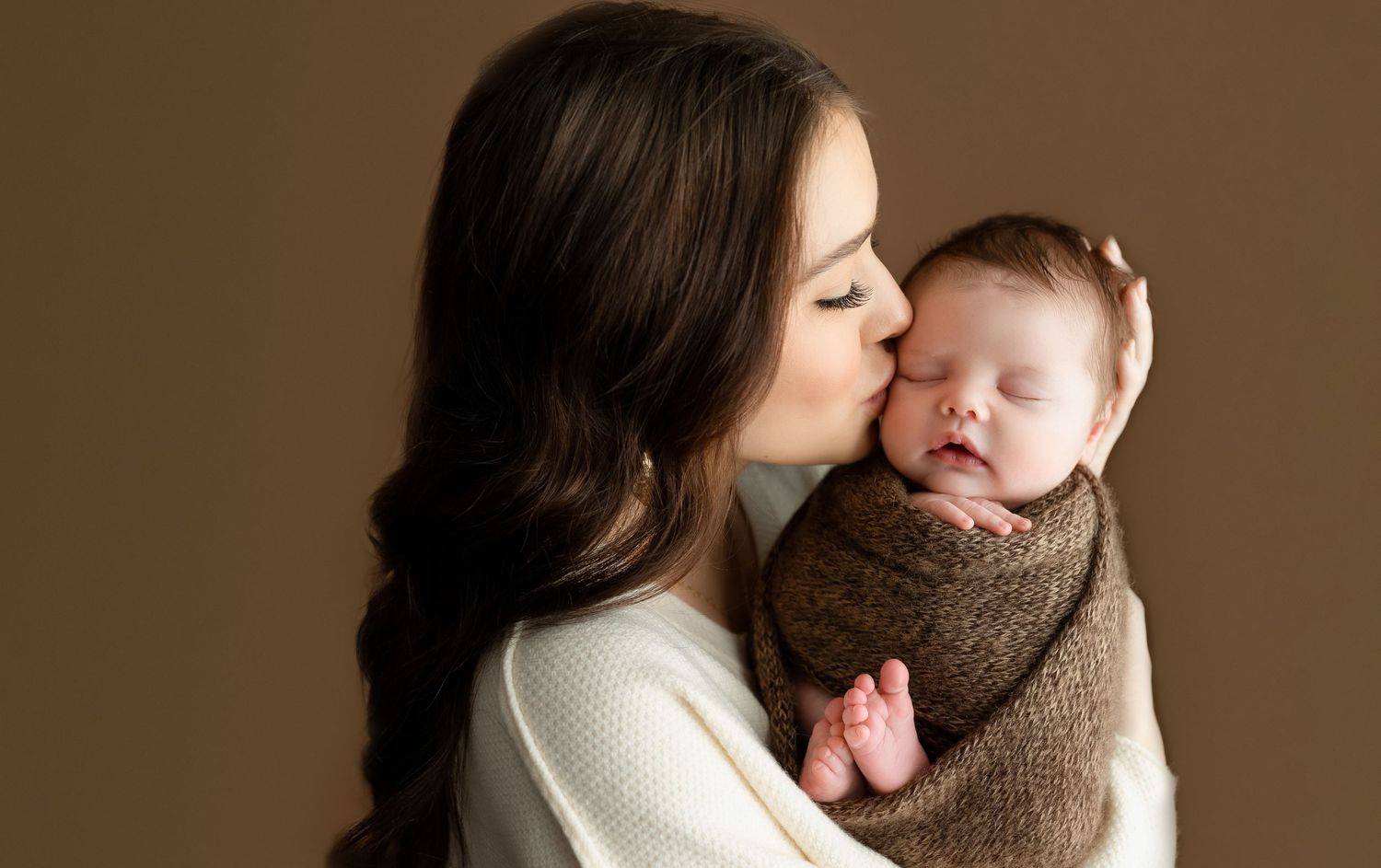A mother kissing her newborn boy. Greenville SC newborn photographer, Easley, SC newborn photographer, Upstate SC newborn