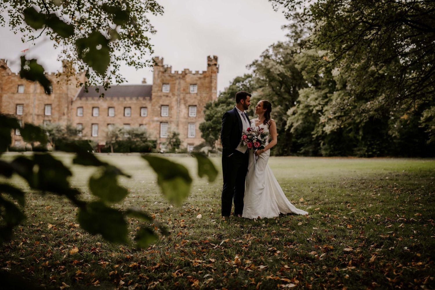 Lumley castle, durham wedding, couple outside and in frontt of the castle