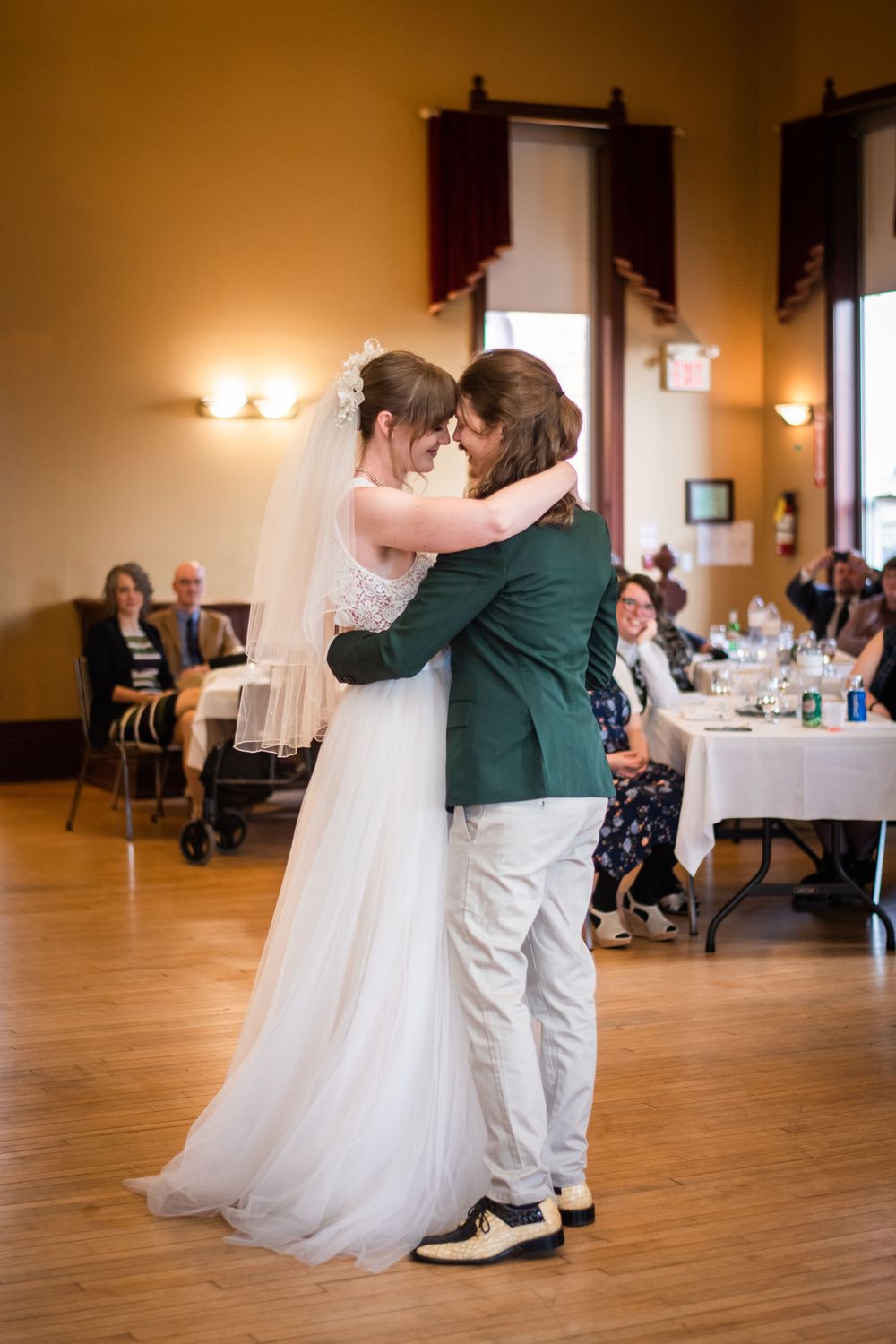 bride and groom first dance at acton town hall wedding reception