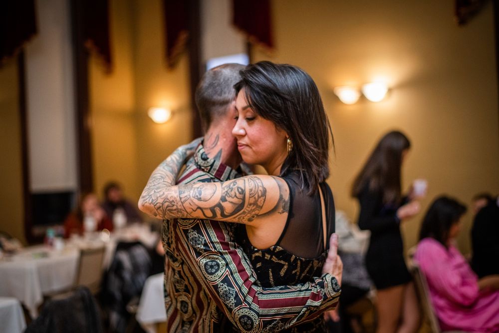 candid guests dancing close up at acton town hall wedding reception