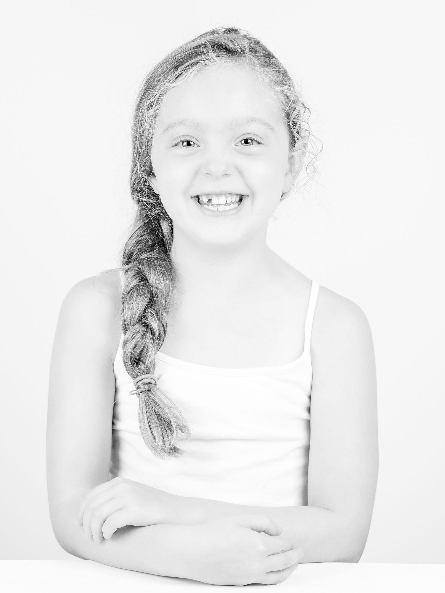 Marco Fossalto Photography - female child - studio portrait black and white photo - high key crisp and happy