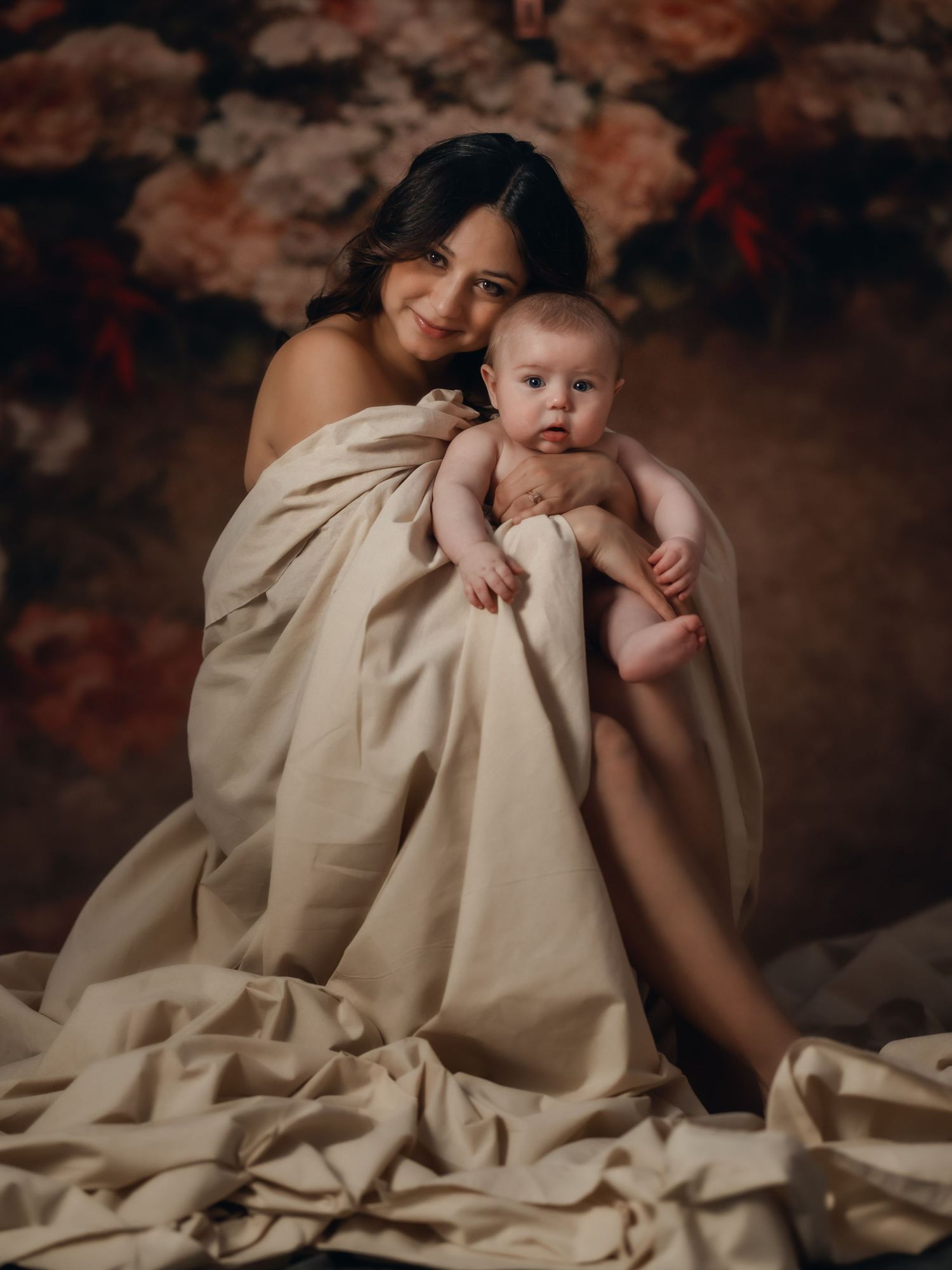 Mother holding her baby in an intimate, timeless motherhood portrait. Toronto motherhood photography.
