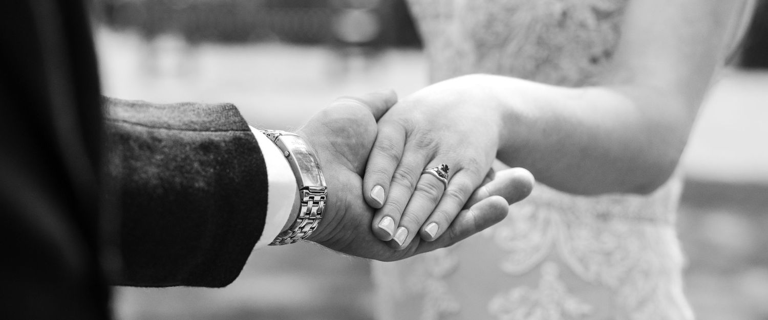 Bride and groom holding hands. elmers court lymington, hampshire