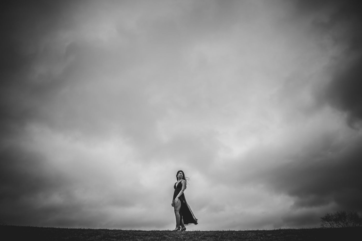 Cloudy day raw emotion windy movement black and white photo