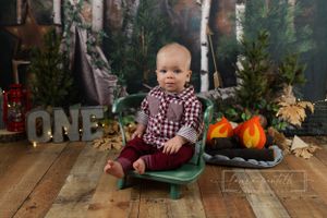 first birthday photos, wilderness first birthday photo, campfire birthday session theme, birthday boy