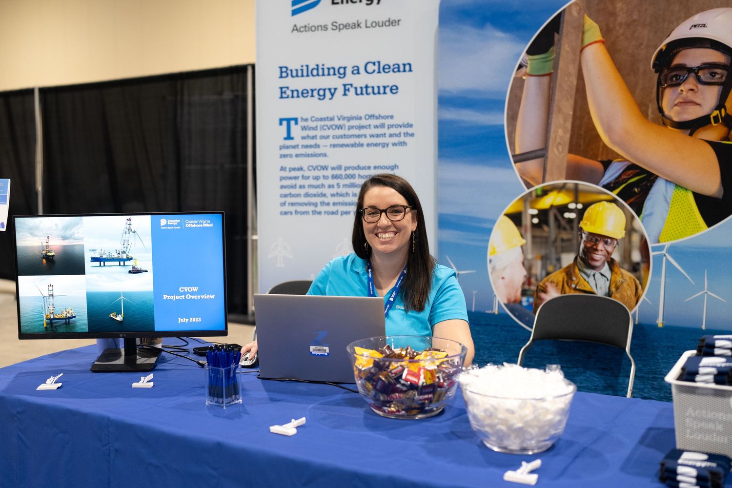 Business professional showcasing products and services at Dominion Energy Procurement event