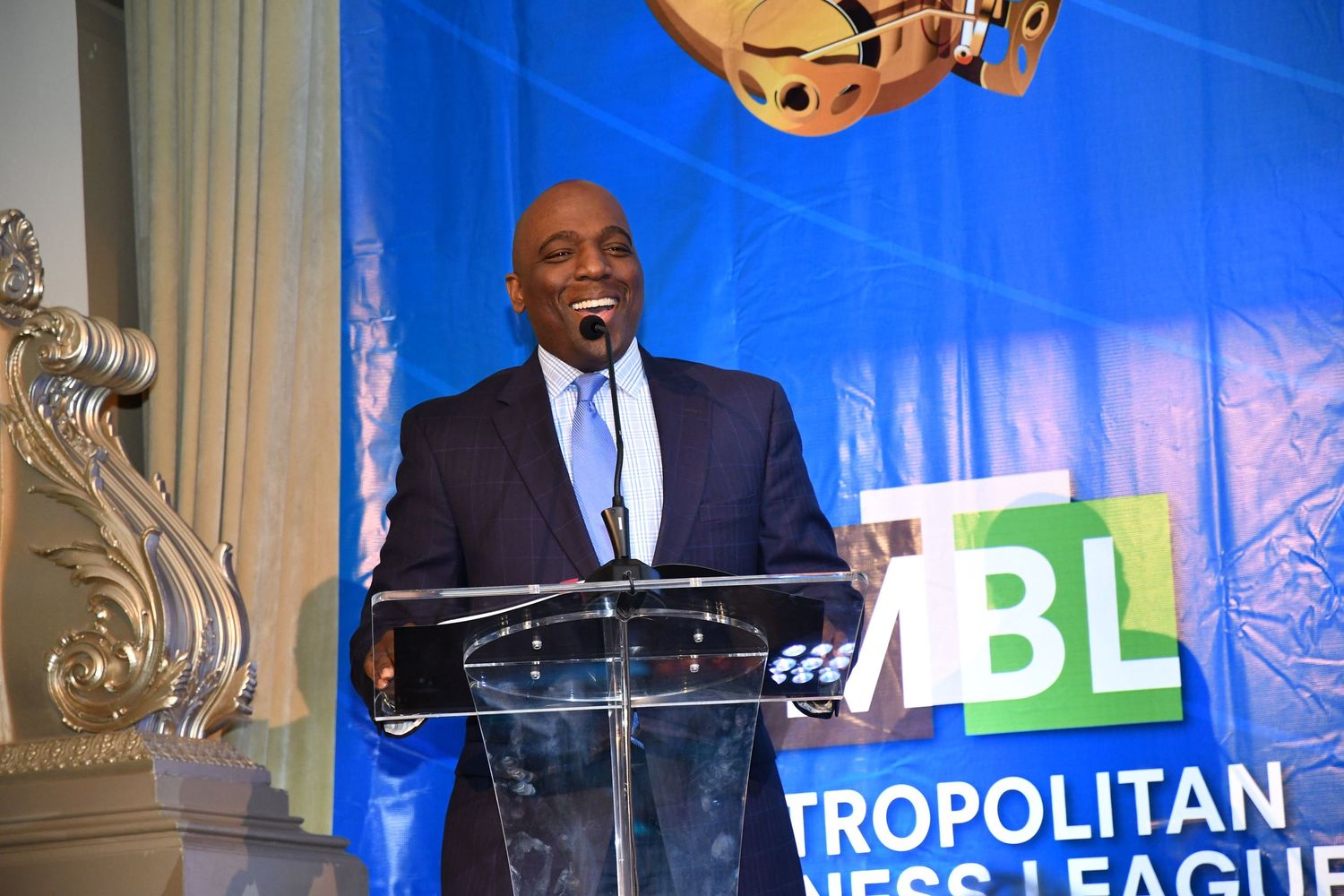 News anchor speaking at award ceremony