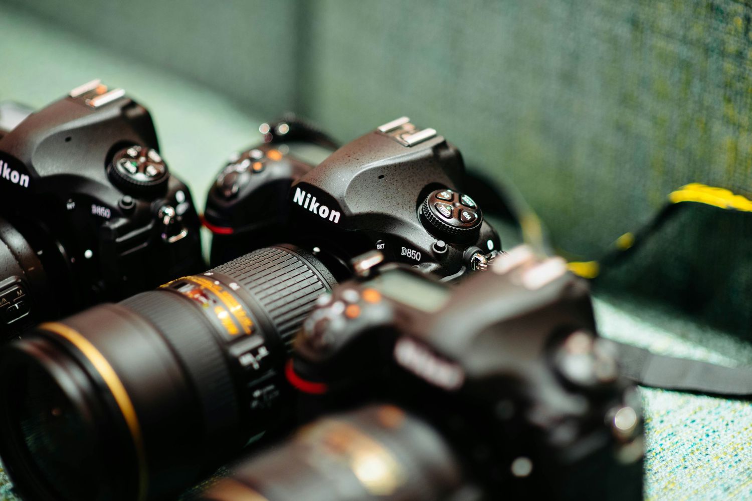a close up image of a Nikon D850 camera on a shelf