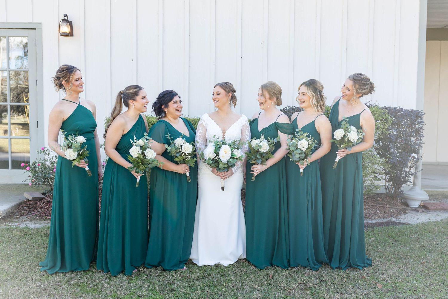 bride and bridesmaids laughing