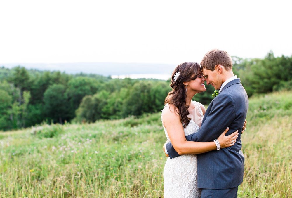 tower hill wedding portrait during the summer in a field of grass