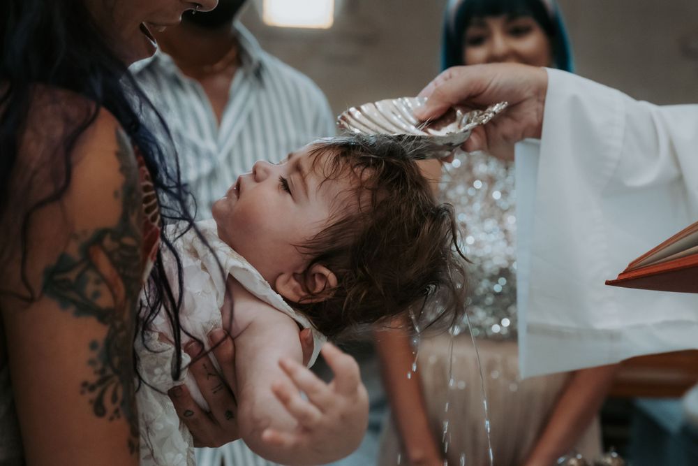 Close-up shots capturing emotional moments during a baptism ceremony.