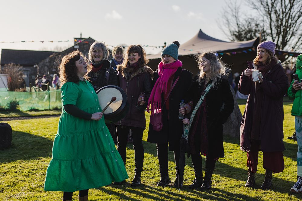 women celebrating Celtic traditions and enjoying breathwork, yoga and other empowering, holistic activities during Festival mna at Dun na Si