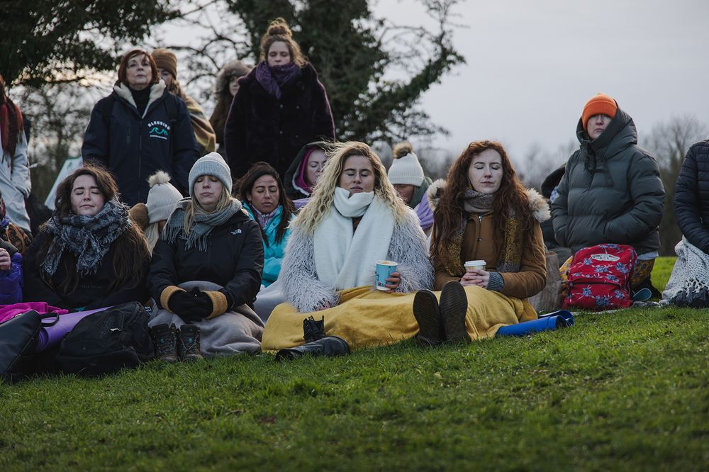 women celebrating Celtic traditions and enjoying breathwork, yoga and other empowering, holistic activities during Festival mna at Dun na Si