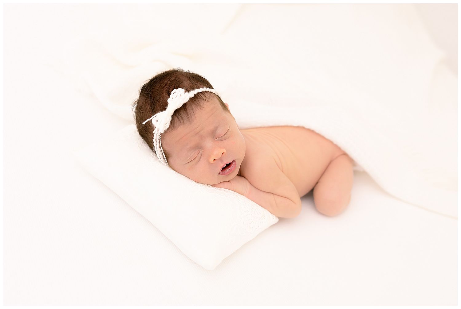 newborn baby on white blanket, newborn photographer chattanooga, baby photos ooltewah studio, portrait baby