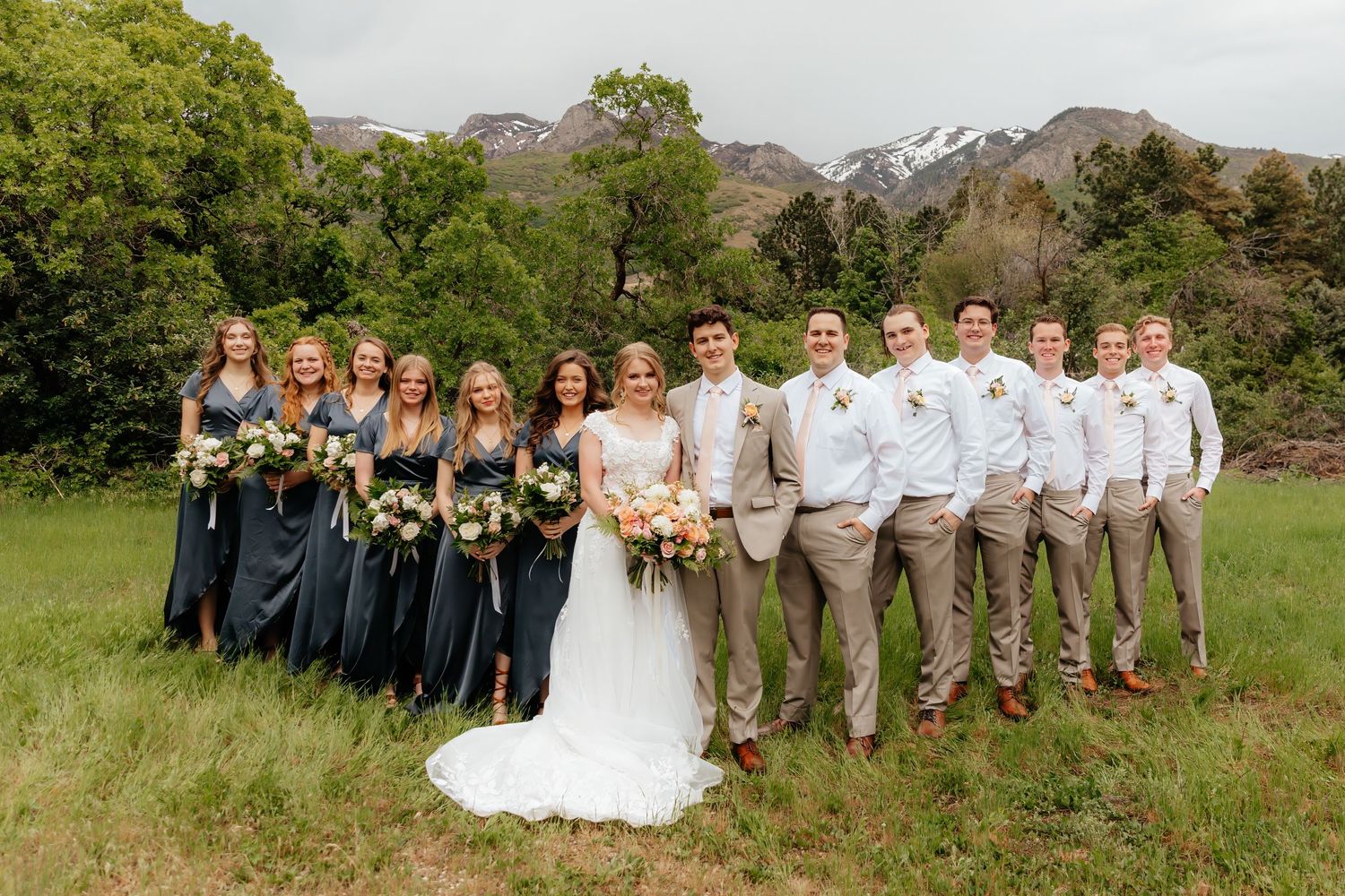 Bride and groom with bridesmaids and groomsmen in Utah Mountain wedding