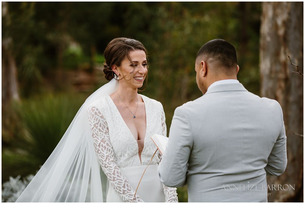 bride listing to her grooms vows