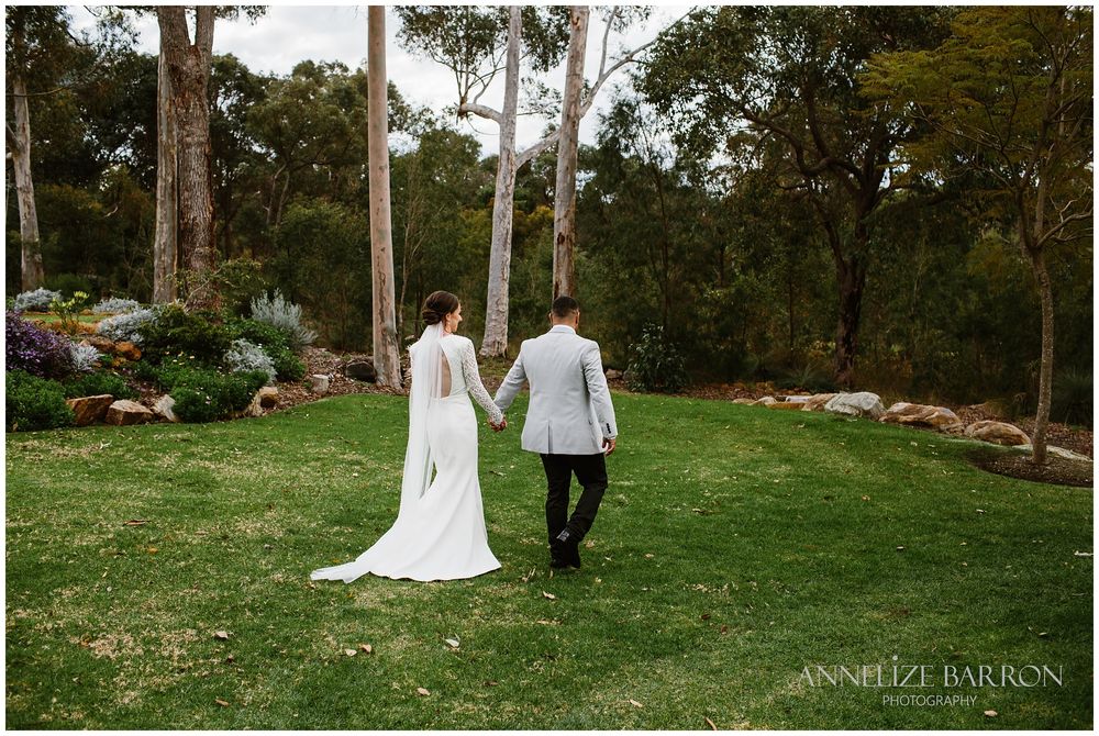 bride and groom going for a walk