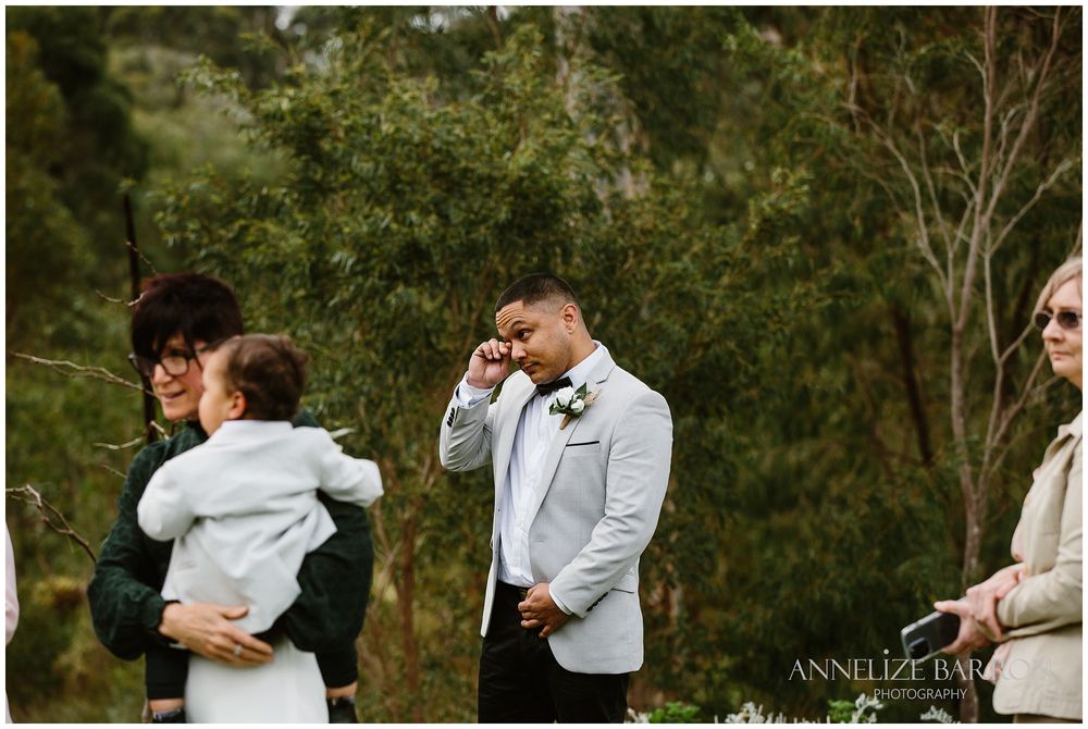 Happs Winery Wedding groom looking at his bride walking in