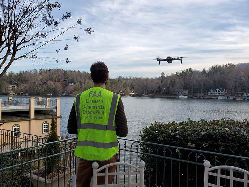 Photo of 454 Cut Away Rd Lake Lure NC Drone hovering in front of photographer virtually calhoun
