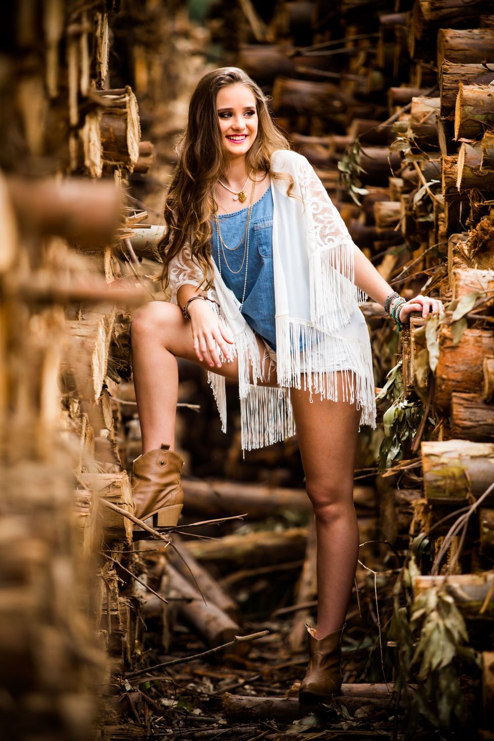Outdoor photo series with fringe details and natural lighting in a rustic setting.