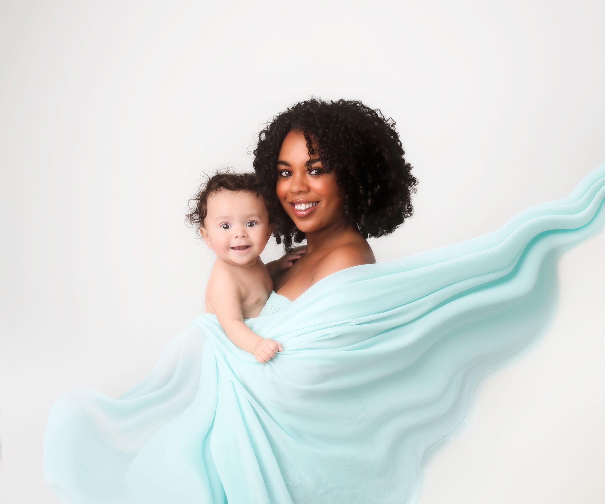 mummy holding her 6 month old baby