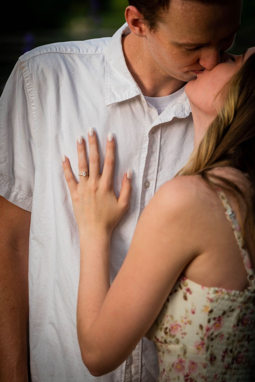 Intimate portrait showing tender moments between a couple during their engagement session.