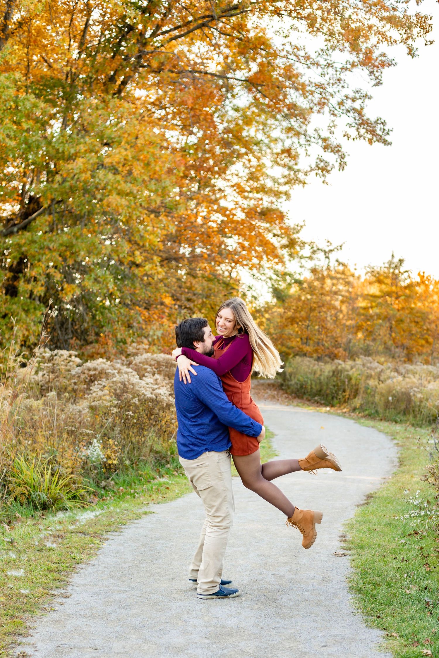 couple twirls around during their cleveland engagement photos
