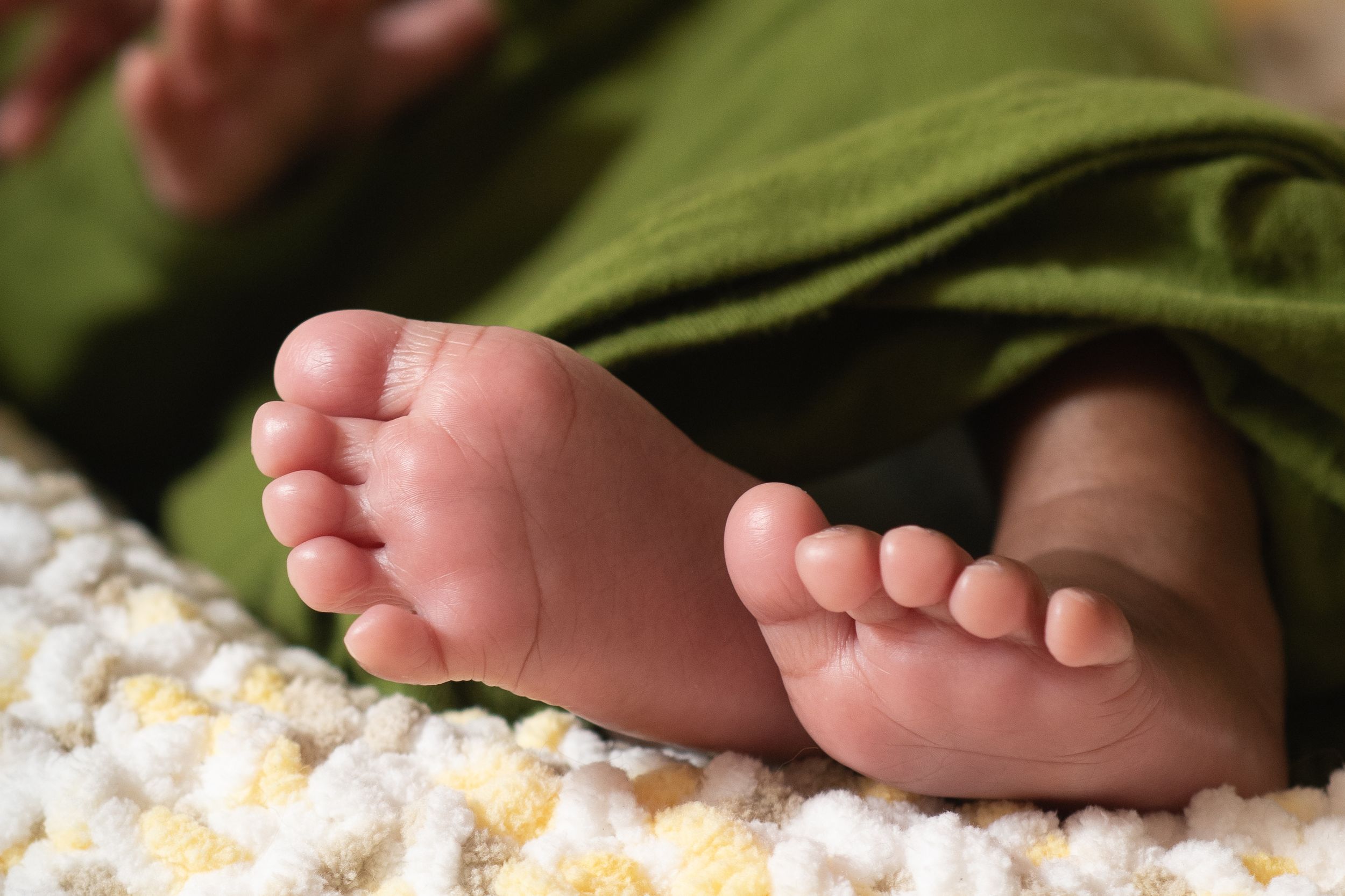 the little details like toes are the best. Close-up of newborn toes during Houston lifestyle newborn photography session