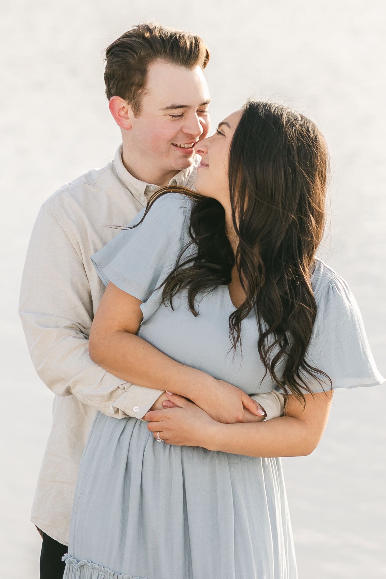 Candid Images shot during an engagement session Light and Airy Winter Engagement by Chelsee Rawe